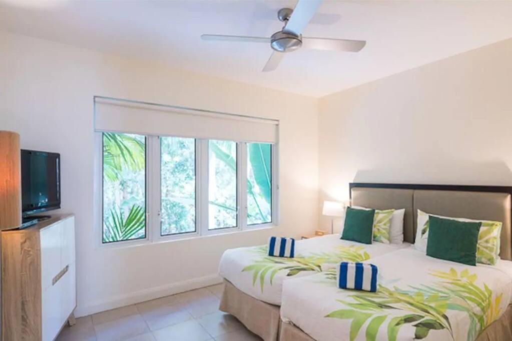 Oasis At The Club: A Tropical Chic Retreat