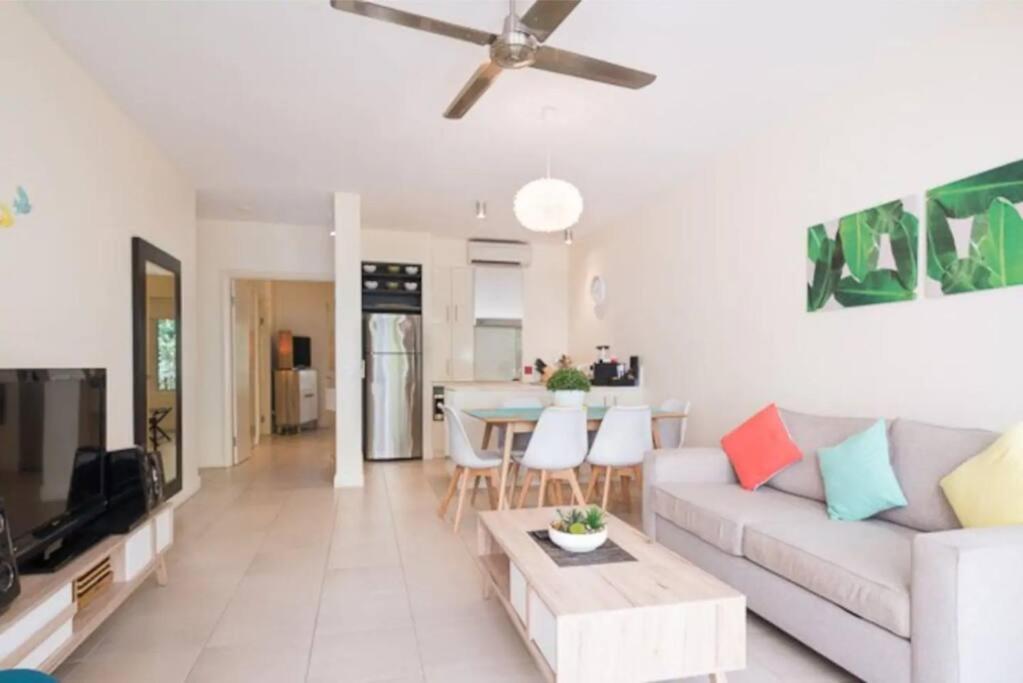 Oasis At The Club: A Tropical Chic Retreat Apartment